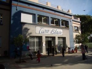 Turó Blau,, Turó Blau, la escuela pública LGBT friendly en Barcelona, El Poblado en Historias